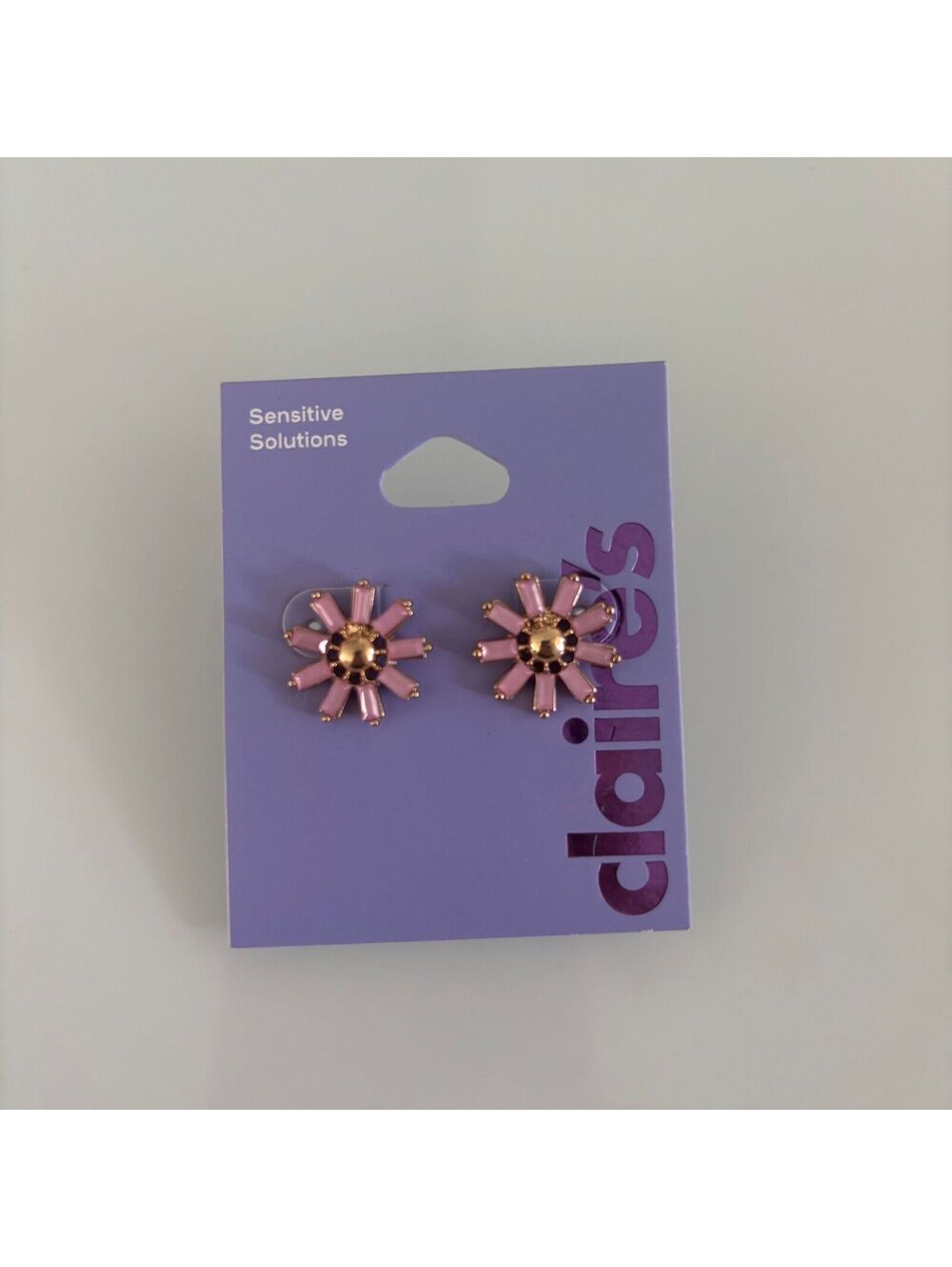 Claire’s pink floral earrings